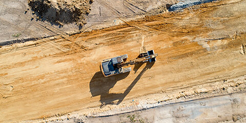 Aerial photo of a backhoe on a mine site
