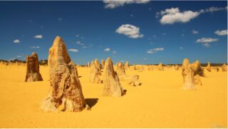 Timescaler Milo Barham was involved in a study dating iron-rich minerals on the Pinnacles, revealing they formed 100,000 years ago during a wet period as the surrounding rock dissolved.