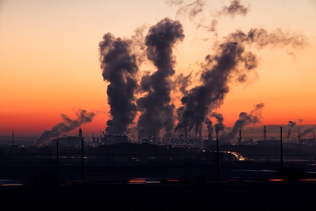 Industrial pollution in sunset