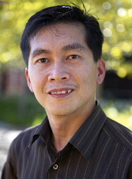 headshot of Professor tele Tan