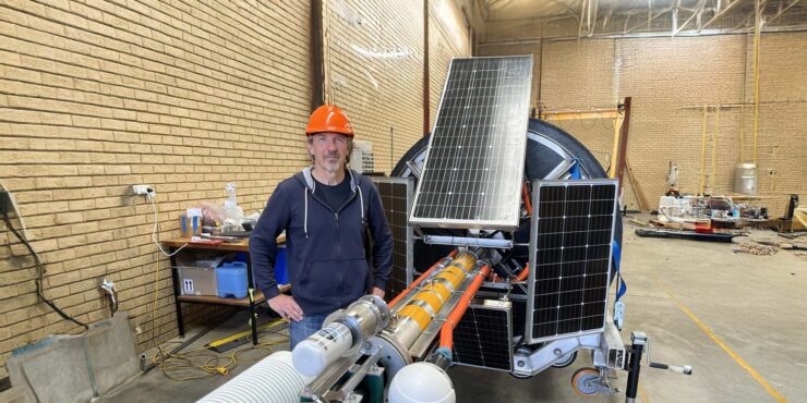 Researcher Prof David Antoine with buoy