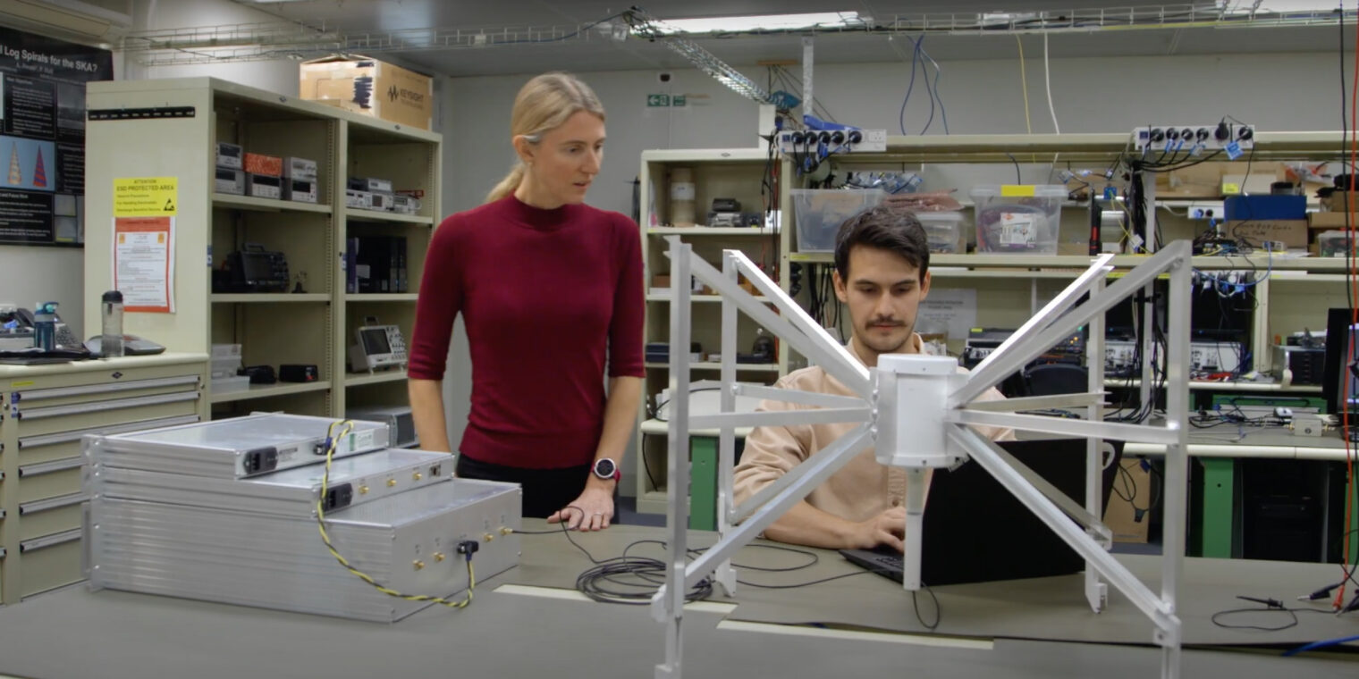 Radio astronomy researchers working on a component of the Murchison Widefield Array - play video