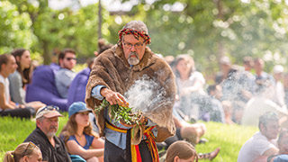Professor Simon Forrest performing a traditional smoking ceremony